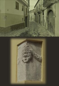 Lucera - Piazza Lecce - Frammento di un sarcofago romano con maschera tragica e festoni reimpiegato